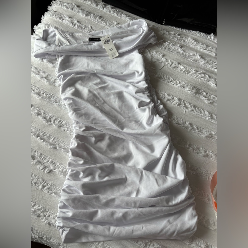 Off-The-Shoulder Twist Ruched
Mini Dress - Picture 5 of 5